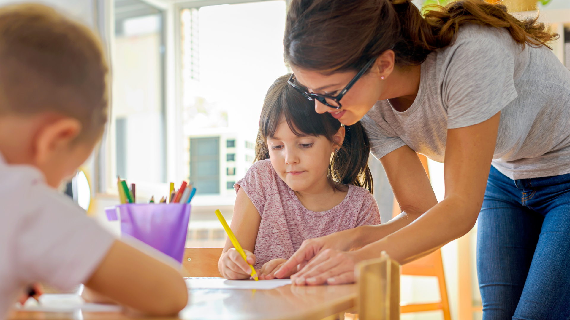 Teacher Helping Students